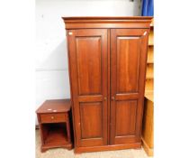 CHERRY WOOD DOUBLE DOOR WARDROBE TOGETHER WITH A FURTHER BEDSIDE CUPBOARD WITH SINGLE DRAWER AND