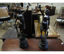 TWO SPELTER FIGURES ON EBONISED BASES