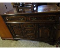 OAK FRAMED AND BURR OAK BANDED DRESSER BASE WITH TWO DRAWERS AND CENTRALLY FITTED WITH THREE DRAWERS