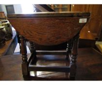 REPRODUCTION OAK JOINT TABLE WITH TWO DROP LEAVES