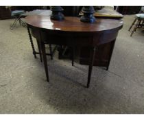 19TH CENTURY MAHOGANY DEMI-LUNE FOLD OVER CARD TABLE ON FOUR TURNED LEGS (A/F)