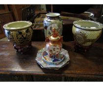 PAIR OF 20TH CENTURY ORIENTAL PLANTERS ON STANDS TOGETHER WITH A VASE, TWO HEXAGONAL PLATES AND A