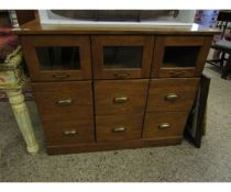 MODERN OAK FRAMED HABERDASHERY TYPE CABINET WITH THREE GLASS DRAWERS OVER SIX PANELLED DRAWERS