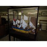 SHIP IN AN ENCLOSED CABINET ON STAND