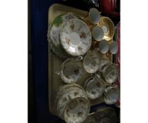 TRAY CONTAINING MIXED ROYAL DOULTON BASKET AND FLOWER DECORATED PART TEA WARES, GILDED PART TEA