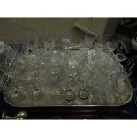 TRAY CONTAINING MIXED CUT GLASS WINE GLASSES, SILVER PLATED SALT CELLARS ETC