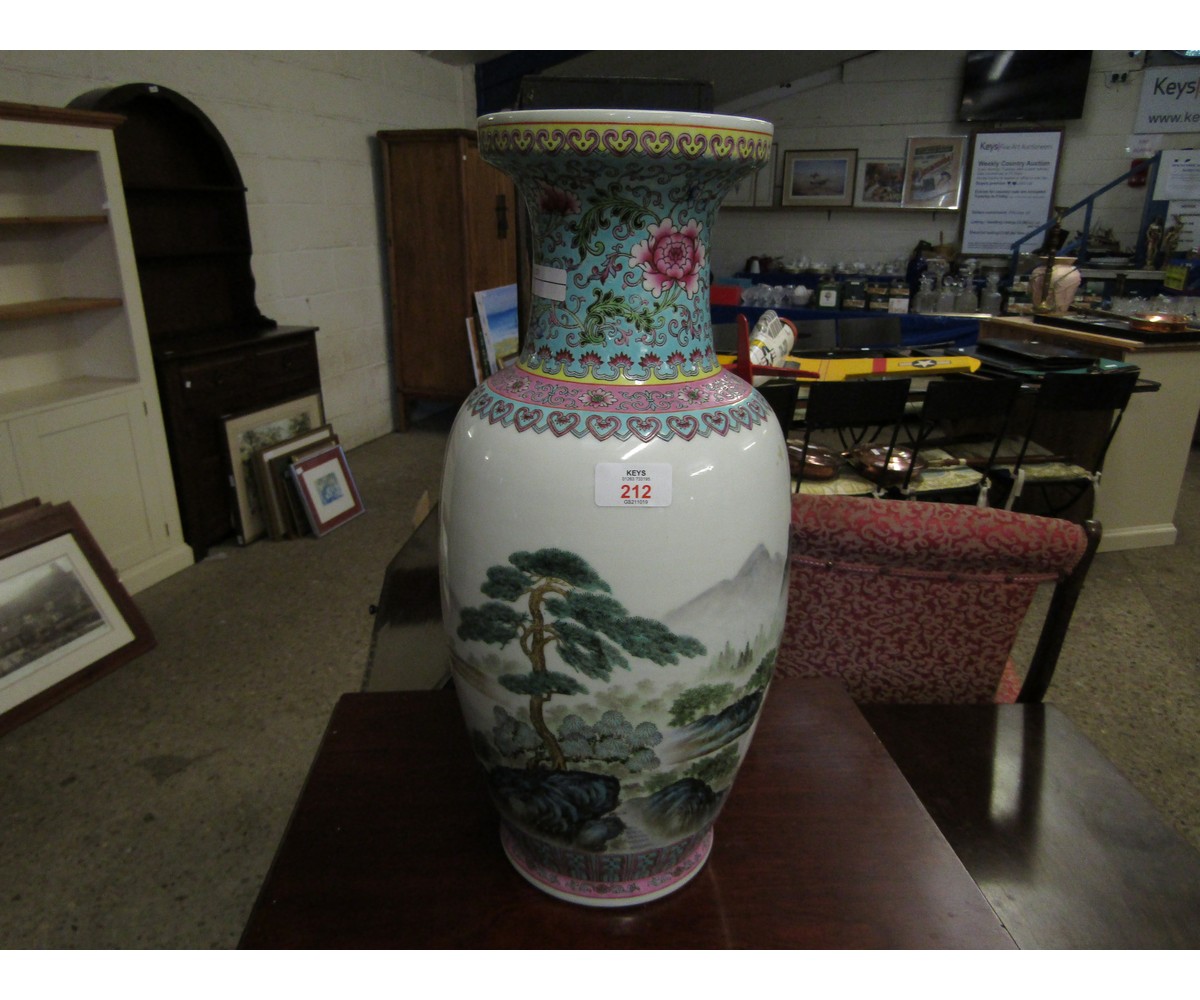 20TH CENTURY FAMILLE VERT VASE DECORATED WITH A LANDSCAPE SCENE