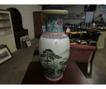 20TH CENTURY FAMILLE VERT VASE DECORATED WITH A LANDSCAPE SCENE