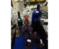 MIXED LOT CONTAINING A BARLEY TWIST CANDLESTICK, BLUE GLASS BOTTLES, CRANBERRY CUT GLASS BASKETS,