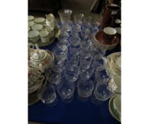 PART SUITE OF ETCHED GLASS WARES TOGETHER WITH A FURTHER SET OF WINE GLASSES