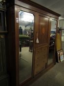 EDWARDIAN MAHOGANY AND INLAID COMPENDIUM WARDROBE, CENTRALLY FITTED WITH CUPBOARD DOOR OVER FOUR