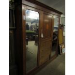 EDWARDIAN MAHOGANY AND INLAID COMPENDIUM WARDROBE, CENTRALLY FITTED WITH CUPBOARD DOOR OVER FOUR