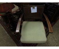 OAK FRAMED CANE BACK AND UPHOLSTERED SEAT CHILD'S ARMCHAIR