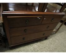EDWARDIAN MAHOGANY TWO OVER TWO FULL WIDTH DRAWER CHEST WITH DROPLET HANDLES RAISED ON TAPERING