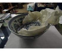 20TH CENTURY ORIENTAL BLUE AND WHITE PRINTED BOWL TOGETHER WITH A FURTHER SAUCER (2)