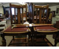 SET OF FOUR OAK FRAMED SPLAT BACK DINING CHAIRS WITH BROWN LEATHER DROP IN SEATS