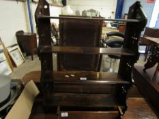 EDWARDIAN MAHOGANY WALL MOUNTED SPICE RACK WITH PIERCED SIDES WITH FOUR SHELVES