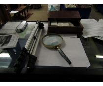 MAGNIFYING GLASS, A TRIPOD AND AN EASTERN HARDWOOD BOX CONTAINING PLATED POCKET WATCHES ETC