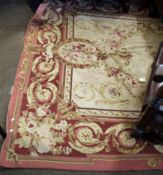 Aubusson style carpet, central floral panel within puce border, 267 x 177cm