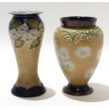 Two Royal Doulton vases, one with a floral design on brown ground (restored), together with a