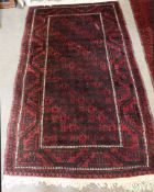 Caucasian carpet, central panel of interlinked geometric lozenges within double gull border, 106 x