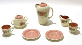 Group of Susie Cooper wares comprising a coffee pot and cover, sugar bowl and milk jug, 2 cups and