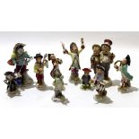 Group of Continental porcelain monkey band figures including a conductor, various musicians and a