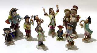 Group of Continental porcelain monkey band figures including a conductor, various musicians and a