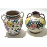 Two mid-20th century Poole Pottery vases, both with loop handles, one with a floral design, possibly