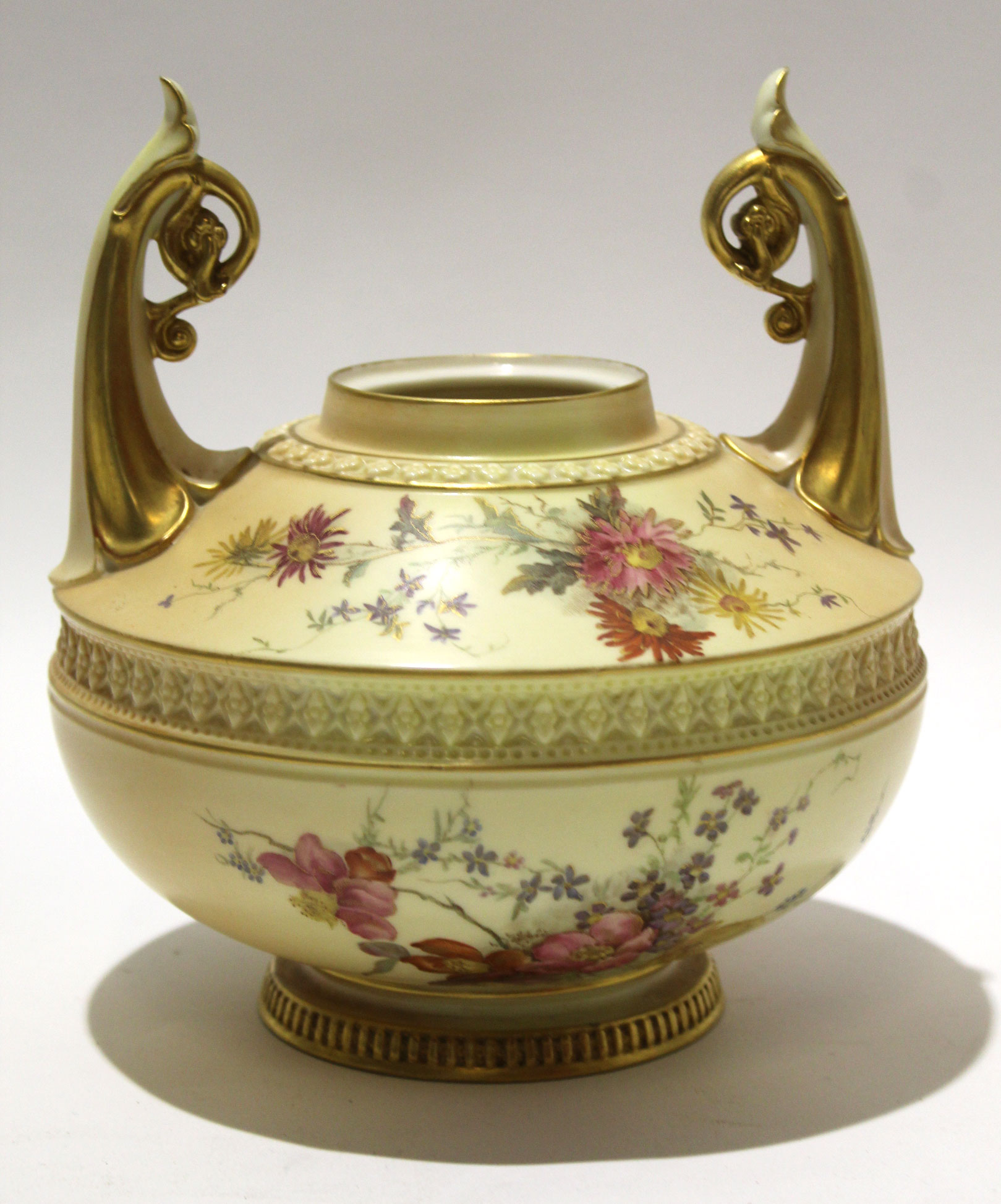 Royal Worcester blush ground vase with Art Noveau style handles, the vase lacking cover, decorated