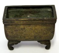 Chinese bronze censer on four scroll feet decorated with geometric motifs amongst ruyi, 13cm long