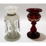 White glass table lustre with gilt decoration to collar, together with a cranberry coloured glass