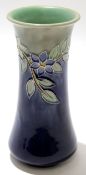 Mid-20th century Royal Doulton vase decorated in blue and green with tube lined floral decoration in