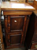 19th century mahogany pot cupboard of square form, trunk fitted with two panelled doors enclosing