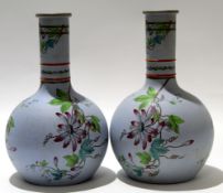 Pair of mid-19th century stoneware vases, the baluster bodies decorated with a painted floral design