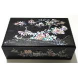 Chinese writing box with mother of pearl design of two cranes amongst rock work, 38cm long