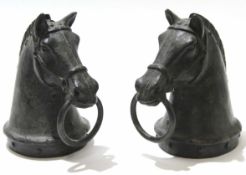 Two spelter models of horses heads, 21cm high (2)
