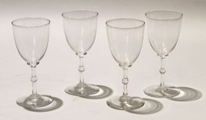 Collection of wine glasses with funnel bowls on a knopped stem, (12)