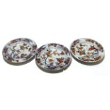 Group of three 18th century Chinese porcelain plates with polychrome and gilt decoration of