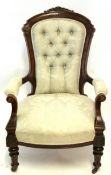 Late Victorian walnut gent's chair upholstered in cream patterned button back