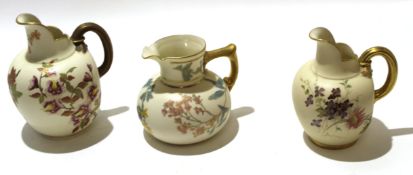 Royal Worcester jug with gilt handle, the blush ground with floral decoration, Worcester puce mark