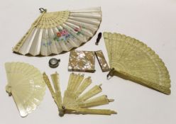 Collection of ivory fans and a mother of pearl card case, plus a miniature seal (qty)