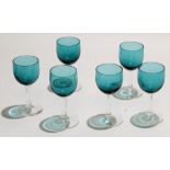 Collection of six wine glasses with funnel bowls coloured in green, 12cm high