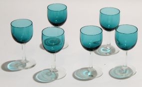 Collection of six wine glasses with funnel bowls coloured in green, 12cm high