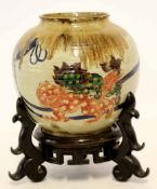 Large Oriental baluster vase with a ribbed body decorated with dragons in a famille rose and famille