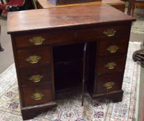 Mahogany Queen Anne style small desk, full width drawer over six further short drawers with