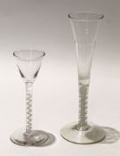 Wine glass with funnel bowl and air twist stem, together with a taller glass with air twist,