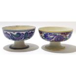 Pair of mid-20th century bowls on stem feet, one with the bluebird pattern, the other with a