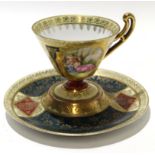 Vienna style cup and saucer decorated in gilt with a panel depicting a classical scene