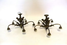 Pair of small reproduction brass five-sconce electroliers, central shafts with figure decoration,